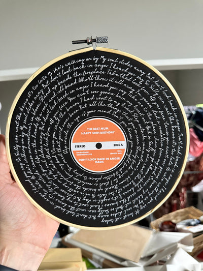 Customer photo — Personalised Song Lyrics Vinyl Record Cotton Canvas Circular Frame