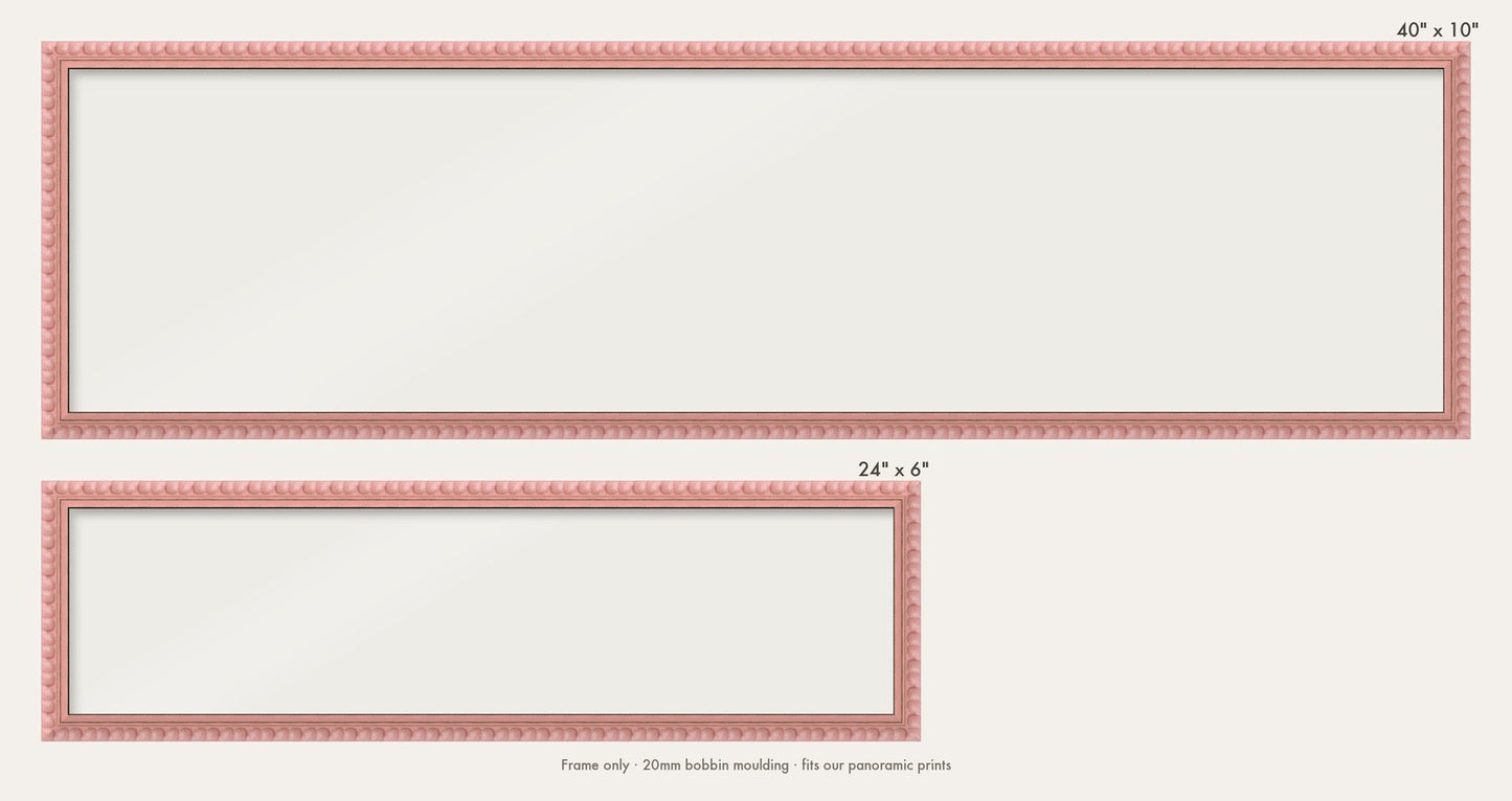 Pink bobbin panoramic frame shown in both sizes, 24" x 6" and 40" x 10"