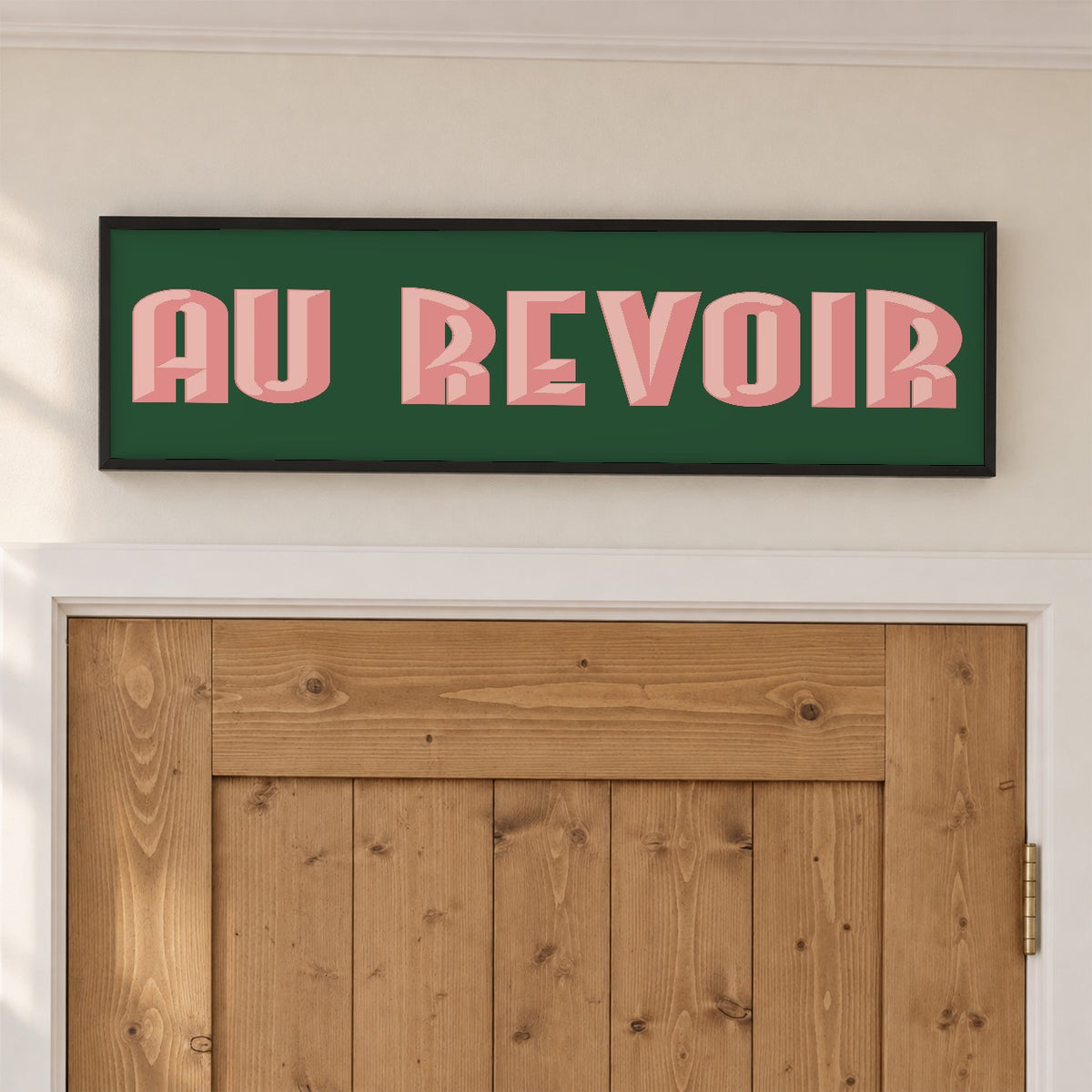 Au Revoir panoramic print framed above an oak hallway door