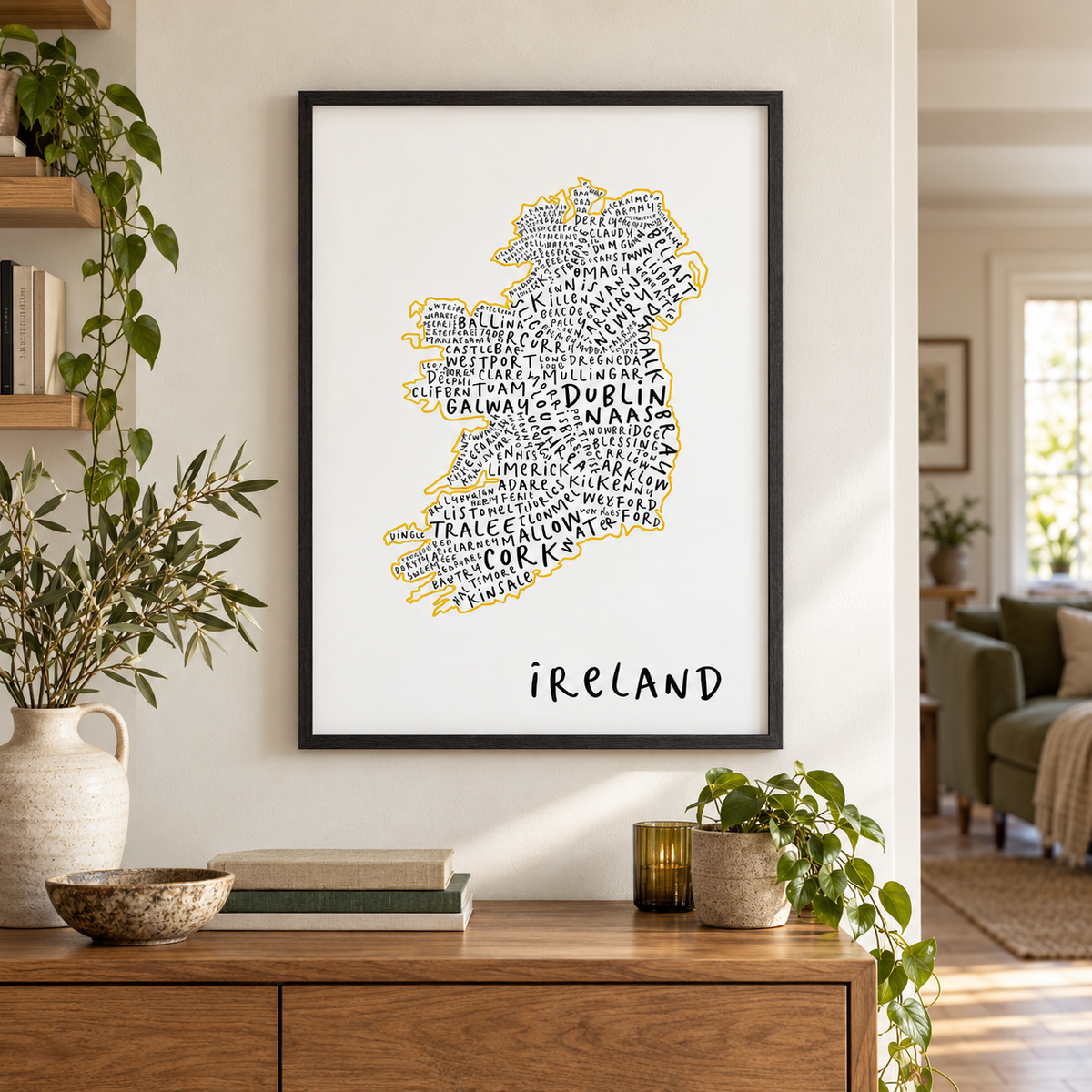 Ireland Typography Map Print — wider room setting, black oak frame