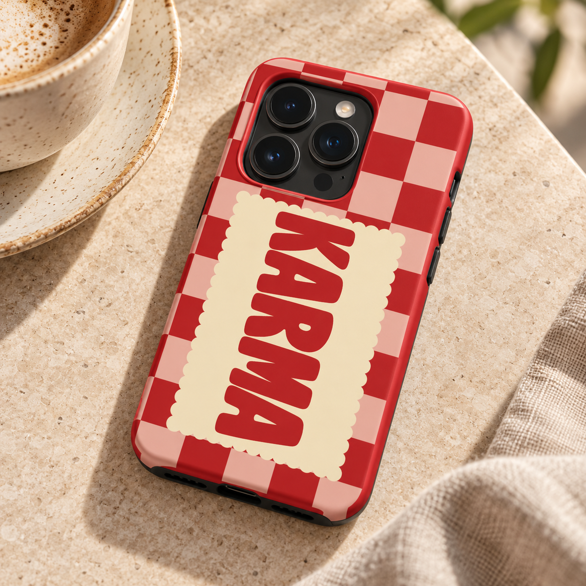 Karma Original Protective Case, matte, on iPhone 15 Pro in an illustrative lifestyle setting.