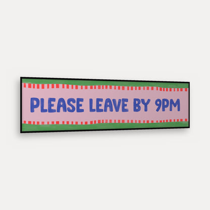 Please Leave By 9pm panoramic print in a matt black frame, angled view