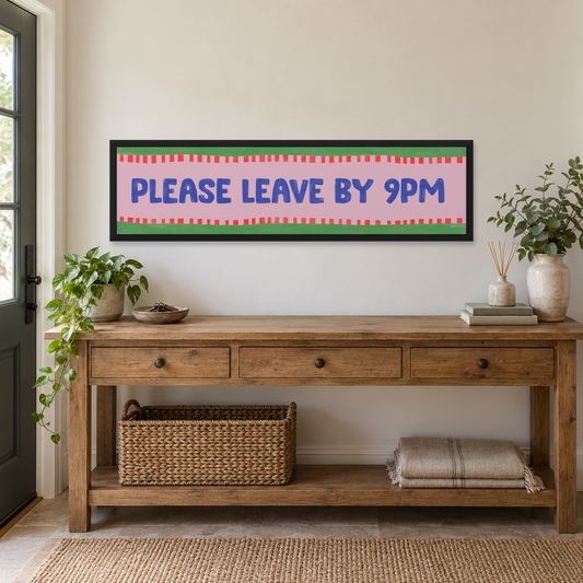 Please Leave By 9pm Panoramic Print — wider room setting, matt black wood