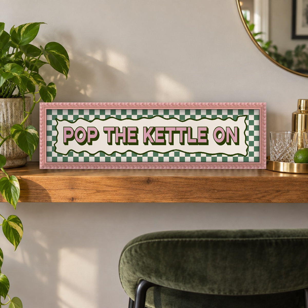Pop The Kettle On panoramic print in a pink bobbin frame in a room setting
