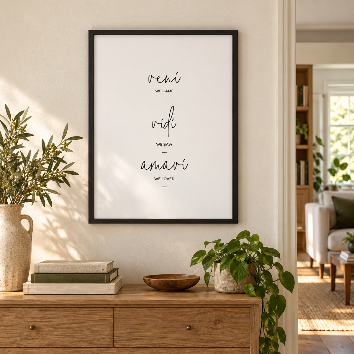 We Came We Saw We Loved Print — wider room setting, black oak frame