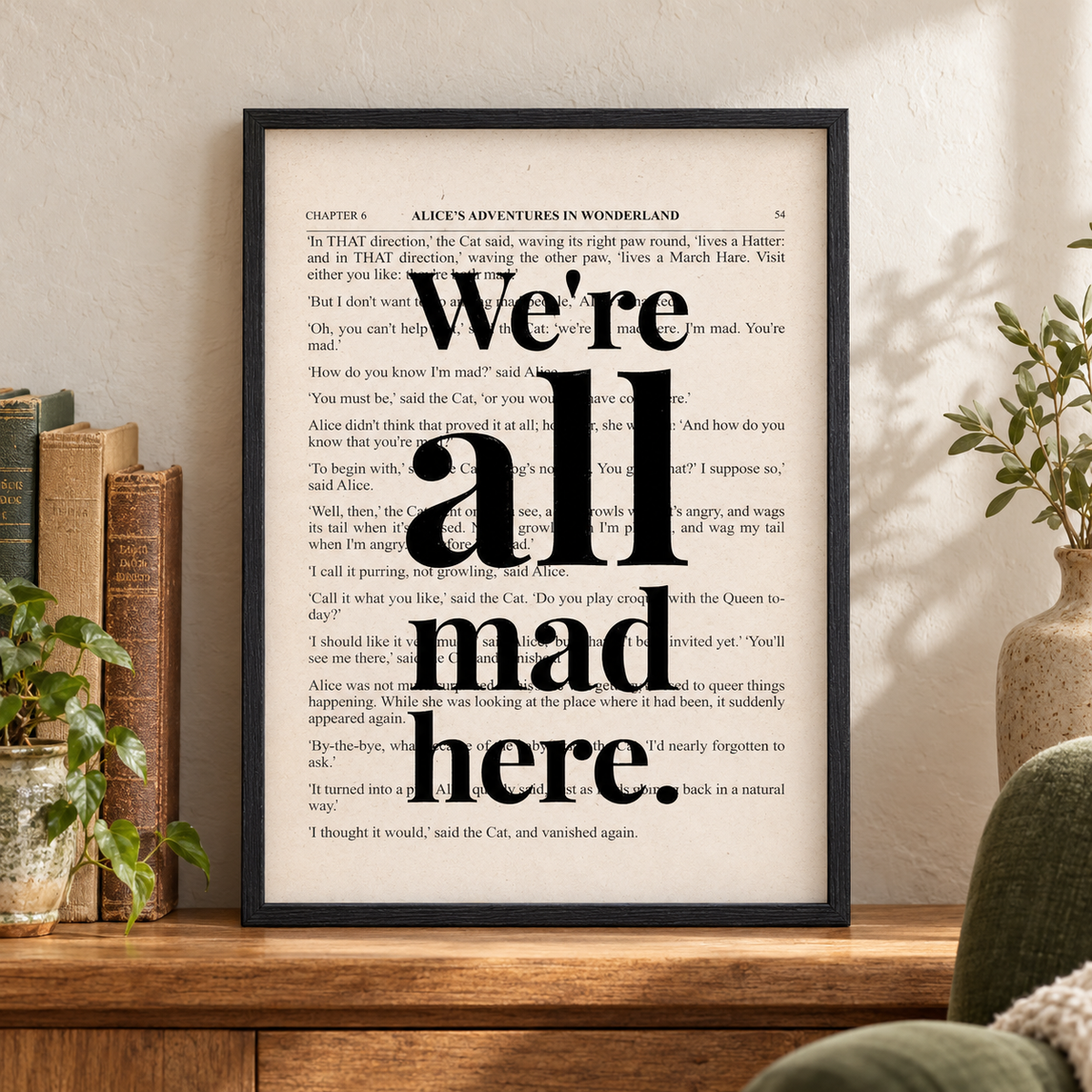 Alice In Wonderland We're All Mad Here Quote Book Print — close lifestyle view, black oak frame